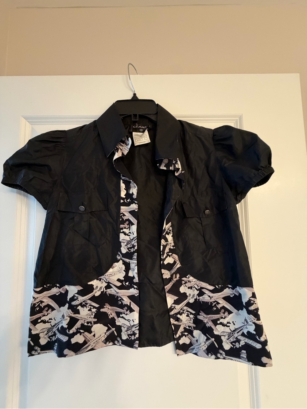 CHANEL Black Short-Sleeve Button-Front Top with Monochrome Printed Hem